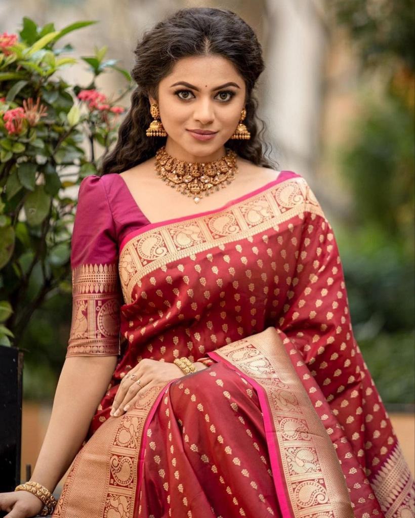 Krisha Litchi Silk Designer Party Wear Sarees Catalog